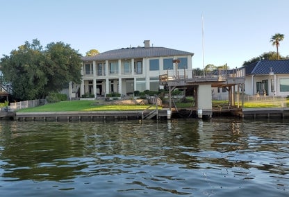 Lakeside view of home in Conroe, TX